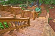 bigstock Wood Stairway To Landscaped Ya 8248661